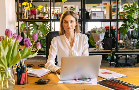 portrait shot of an employee using a laptop