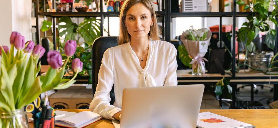 portrait shot of an employee using a laptop