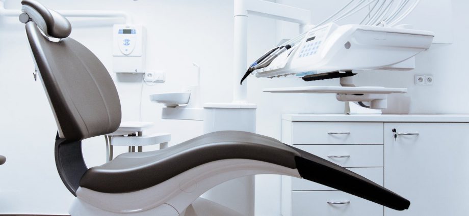 black and white dentist chair and equipment