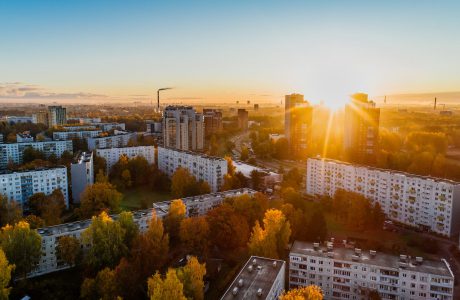 aerial view of white concrete buildings during golden hours