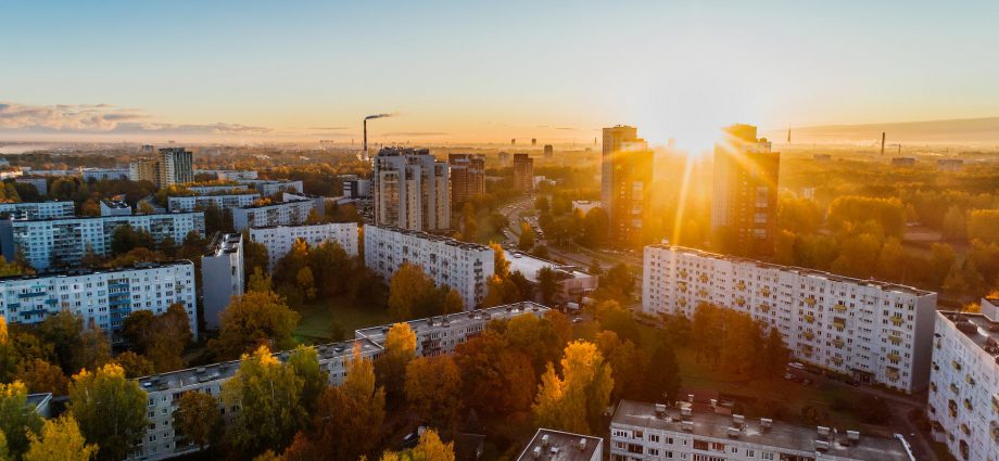 aerial view of white concrete buildings during golden hours