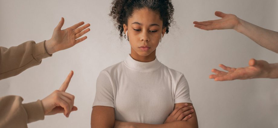 faceless people scolding discontent black girl