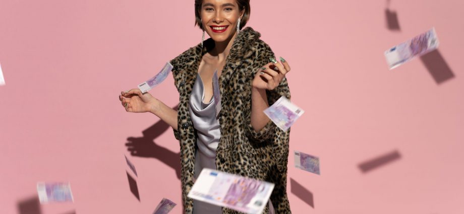 smiling woman in fur coat posing